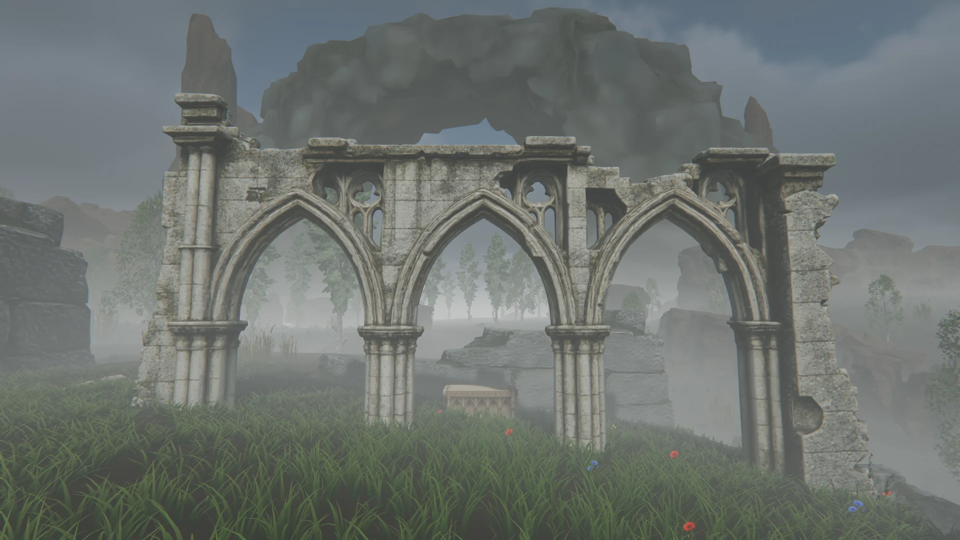 Three weathered Gothic arches rise from the wildflowers at Bellmoor Sanctuary.